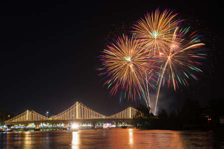 SURATTHANI, THAILAND - OCTOBER 17 : Beautiful firework display for celebration on the Tapee river on parades in Chak Phra Festival on October 17, 2015 in Suratthani, Thailand.のeditorial素材