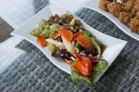 Thai Food made of plantain and chicharron served with meat and broth close-up on a plate on the table. horizontal top view from aboveの写真素材