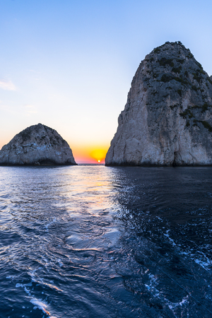 Stones at the sea at the sunsetの写真素材