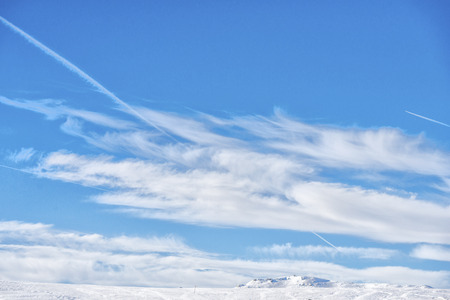 Winter clouds in the mountainsの写真素材