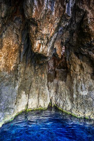 Inside of the sea cave in Greeceの写真素材