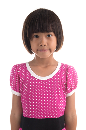 Little asian girl holding black board on white backgroundの写真素材