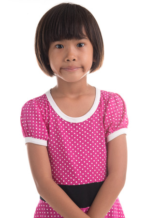 Little asian girl Portrait of a emotional beautiful little girl, Isolated on whiteの写真素材