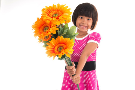Little asian girl Flower Child Holding Flower on white backgroundの写真素材