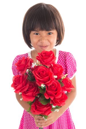 Little asian girl holding a rose on white backgroundの写真素材
