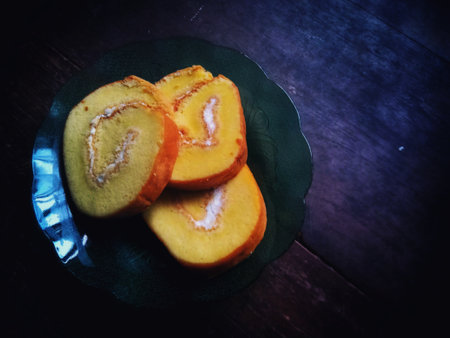 Slices of cake on a plate. Toned.
