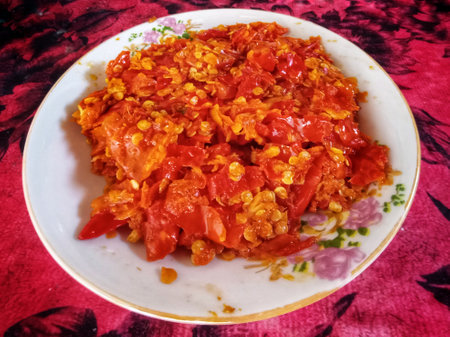 Korean food, Kimchi in a white plate on a red backgroundの写真素材