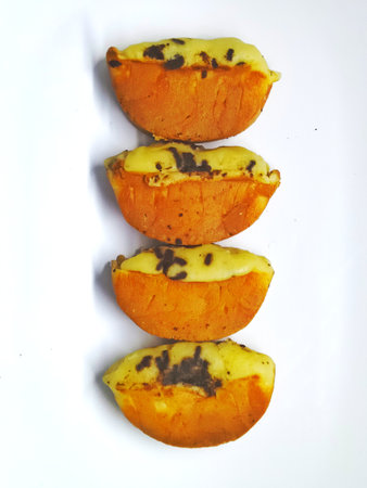 pastries with chocolate chips on a white backgroundの写真素材