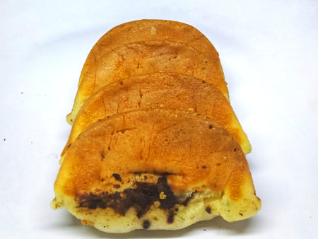 baked bread isolated on a white background, closeup of photo