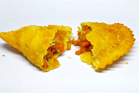 Fried dumplings with vegetables on a white background, isolatedの写真素材