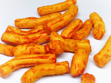 Crispy fried potatoes on a white background, close-upの写真素材