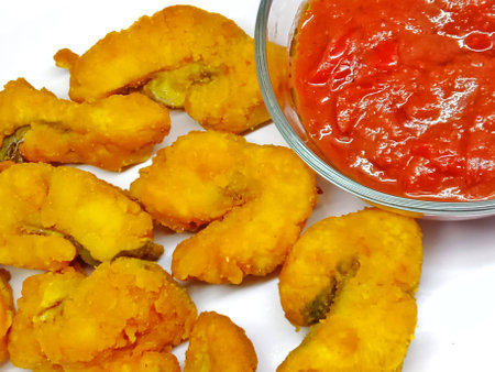 Fried prawns with tomato sauce on a white background.の写真素材