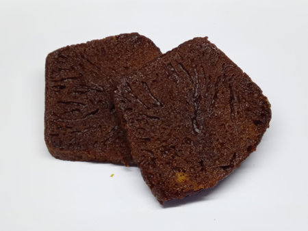 Slices of brown bread on a white background, isolate.の写真素材