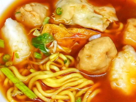 Chinese noodle soup with pork and dumpling, closeupの写真素材