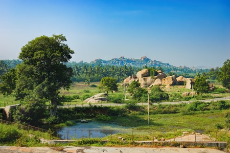 Landscape with unique mountain formation with amazing stones, tropical nature and the road to the...