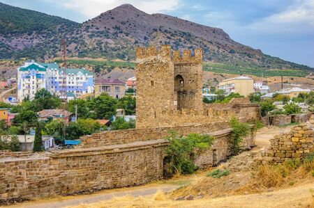 Walls of Genoese fortress in Sudak, Crimea. Scenic views of rocky cliffs near ancient Genoese...