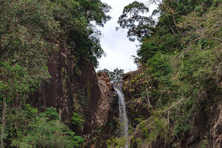 Khlong Phlu waterfall in deep forest at Mu Koh Chang National Park, Chang island, Thailand.の写真素材