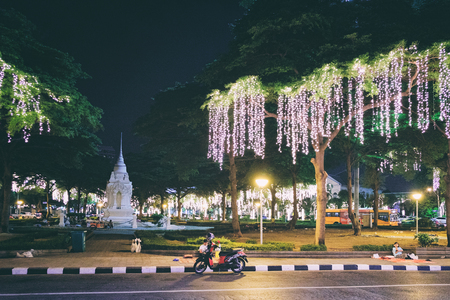 Bangkok, Thailand - December 7, 2015: Street night life in Bangkok. Na Phra That Alley near Sanam Luang is the historic center of Bangkok which decorated with glowing bulbs.のeditorial素材