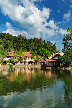 Langkawi, Malaysia - February 16, 2016: Oriental Village gateway to ride a cable-car up Mat Cingcang mountain. Luxury Paradise by the lake, restaurants, spa home, hotels and shops for touristsのeditorial素材