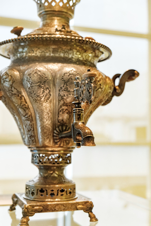 Front view of vintage metal copper tea samovar which was used for a long time. Selective focusの写真素材