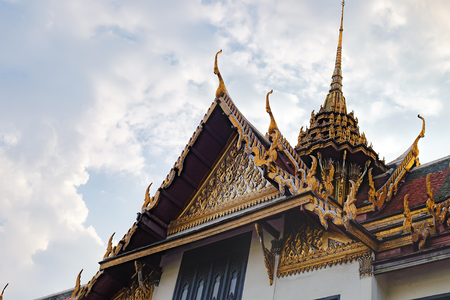 Colorful rooftops of Temple of the Emerald Buddha, Wat Phra Kaew in Bangkok, Thailand.のeditorial素材
