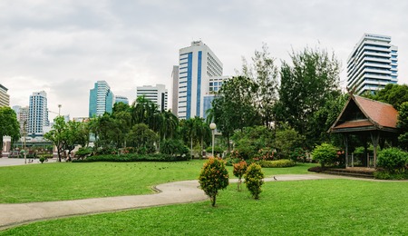 Bangkok, Thailand - December 23, 2015: Panorama view of Bangkok skyline from Lumphini Park, Thailand. Lumphini Park is a popular place for walks and sport activities in the heart of Bangkok.のeditorial素材