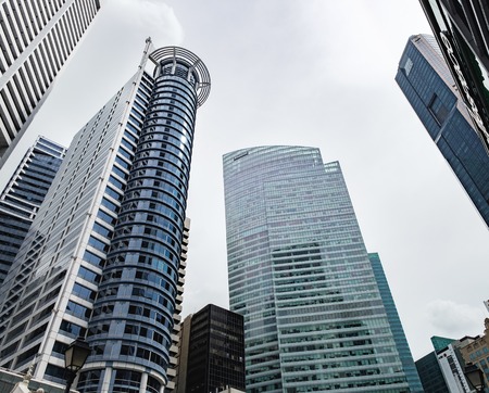 Singapore, Singapore - January 16, 2018: Bottom view of blue skyscrapers in the Raffles Place, Central Business District of Singaporeのeditorial素材