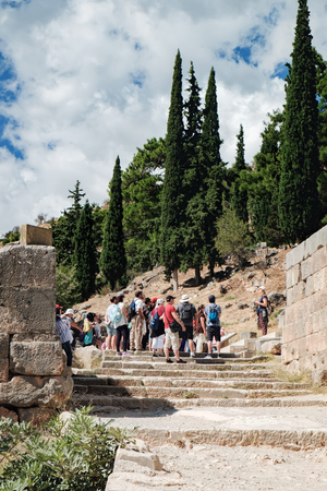 Delphi, Greece - September 21, 2017: Tourists visit to Temple of Apollo in Delphi, Central Greeceのeditorial素材