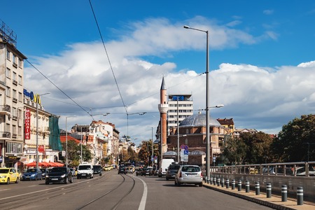 Sofia, Bulgaria - September 12, 2017: Street view of the city center of Sofia with Banya Bashi Mosque.のeditorial素材