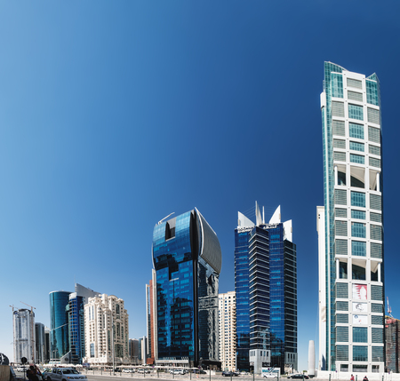 Doha, Qatar - March 3, 2018: Panoramic view of the futuristic skyline in the financial district of...