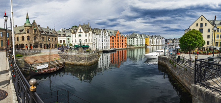 Great summer view of Alesund port town on the west coast of Norway, at the entrance to the Geirangerfjord. Old architecture of Alesund town in city centre.の写真素材