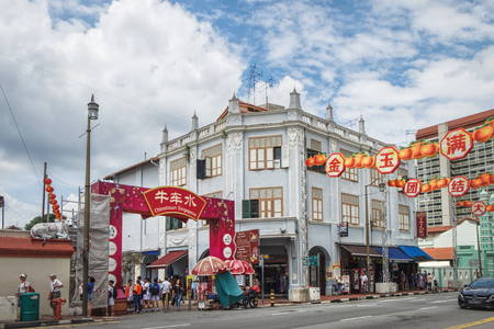 Singapore, Singapore - January 17, 2018: Tourists visit Chinatown - one of the main attractions of Singapore. View of the main entrance from the South Bridge Roadのeditorial素材