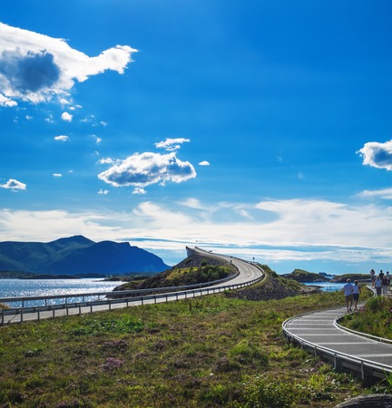 More og Romsdal, Norway - July 30, 2018: Tourist visiting and enjoying Storseisundet bridge in the county of More og Romsdal, the main attraction of the Atlantic road on the west of Norwayのeditorial素材