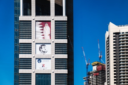 Doha, Qatar - March 3, 2018: Futuristic skyline Dolphin Energy Tower is located on Conference Centre Road in the financial district of Doha, Qatar.のeditorial素材
