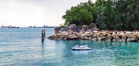Singapore, Singapore - January 16, 2018: Jet ski in water near Siloso Beach, Sentosa Island, Singaporeのeditorial素材