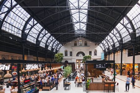 Oslo, Norway - August 3, 2018: Inside view of the Oslo Central Station with a lot of shops and cafes, where passengers can relax and dine.のeditorial素材