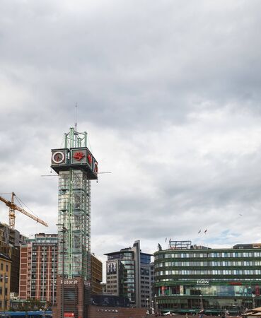 Oslo, Norway - August 3, 2018: Modern buildings at Jernbanetorget square in front of Oslo Central Railway Station, main railway station in Oslo, Norway.のeditorial素材