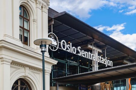 Oslo, Norway - August 3, 2018: The main entrance to the Oslo Central Railway Station in Norway. The sign with the name of the station.のeditorial素材