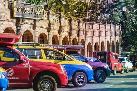 Chiang Mai, Thailand - February 7, 2018: A lot of colorful taxi cars in a row waiting for passengers near the Wat Phra That Doi Suthep, which is the major tourist destination in Chiang Mai, Thailand.のeditorial素材