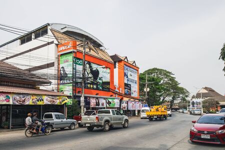 Chiang Rai, Thailand - February 9, 2018: Day traffic at Singhaclai Road, near Wat Phra Sing, which is one of the main tourist attractions in Chiang Raiのeditorial素材