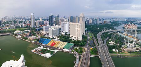 Singapore - January 19, 2018: Aerial view of Singapore business district and city at twilight in...