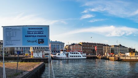 Helsinki, Finland - July 24, 2018: Scenic summer panorama of the Old Port pier architecture and...
