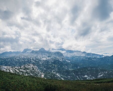 Panoramic summer view of Dachstein Mountains taken from Krippenstein cable car station, Salzkammergut region, Upper Austria, Austriaの写真素材
