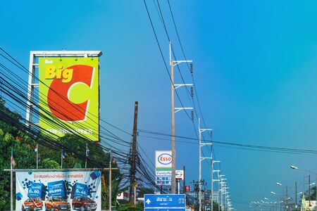 Krabi, Thailand - February 15, 2018: Supermarket Big C Supercenter and Esso gas station at the highway Phet Kasem Road, Mueang Krabi District, Thailandのeditorial素材