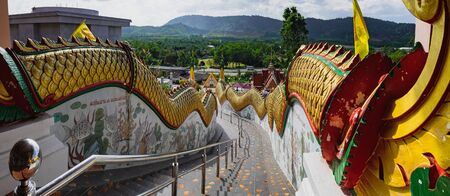 Ladder with dragons in public temple Wat Waree Banprot on Phet Kasem Road, Bang Non, Ranong district, Thailandの写真素材