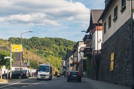 Vallendar, Germany - August 11, 2018: Road with cars along the River Rhine with beautiful old houses, hotels and restaurants. Waterfront of River Rhine.のeditorial素材