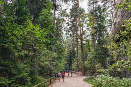 Adrspach, Czech Republic - August 16, 2018: Tourists visit and enjoy views of famous sandstone rock towers of Adrspach and Teplice Rocks , Adrspach National Park in Czech Republicのeditorial素材