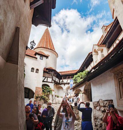 Bran, Romania - September 7, 2017: Tourists visit inside part of Bran or Dracula Castle and take pictures, Transylvania, Romania.のeditorial素材