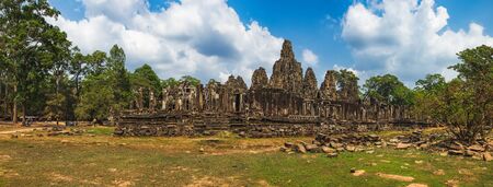 Prasat Bayon with smiling stone faces is the central temple of Angkor Thom Complex, Siem Reap, Cambodia.の写真素材