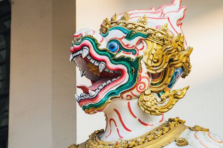 Head of giant stucco statue in Chinese style is located near Sala Chalermkrung Royal Theatre in...